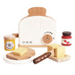 Children's toy toaster set with wooden slices, butter, and jam on a white background