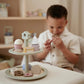 Child playing tea party with Little Dutch wooden tea set