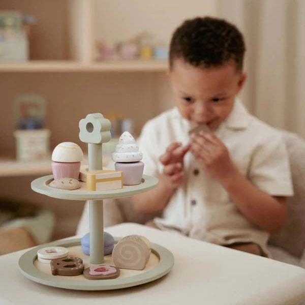 Child playing tea party with Little Dutch wooden tea set